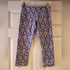 Lululemon Wonder Under pink and purple floral crop leggings size 6